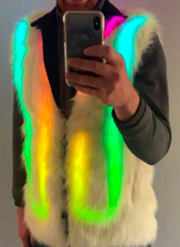 A fur vest with animated leds sown into the fabric